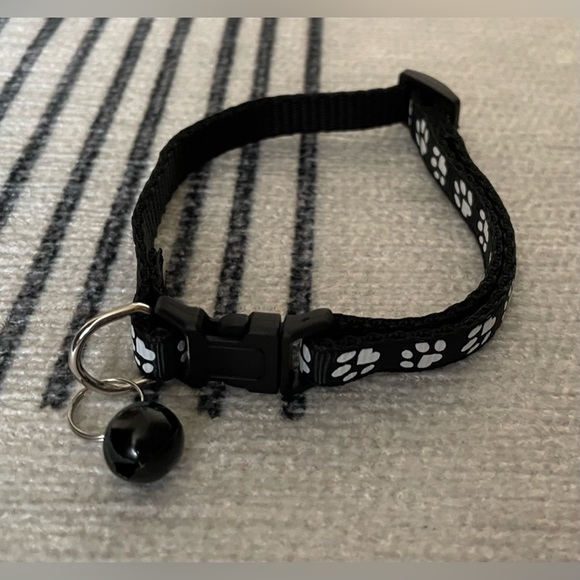 Collar with White Paw Print Pattern and Matching Bell and Buckle - Picture 8 of 15